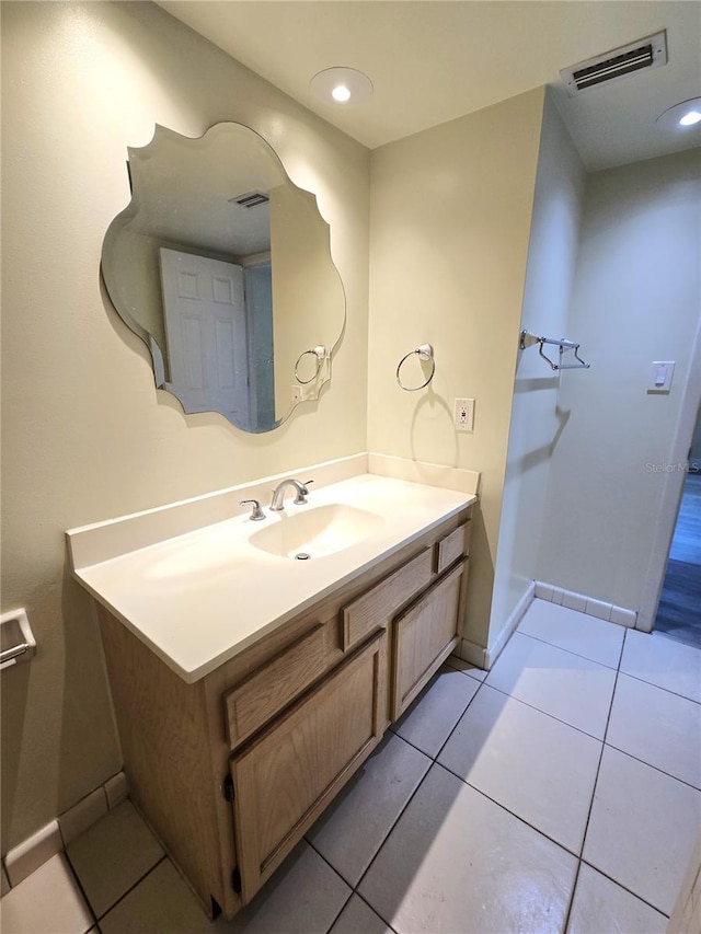 8300 Bardmoor Blvd Unit 110, Seminole, FL 33777 - bathroom with vanity, tile patterned flooring, and recessed lighting