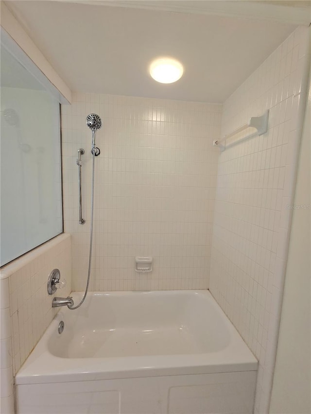 8300 Bardmoor Blvd Unit 110, Seminole, FL 33777 - bathroom featuring  shower combination