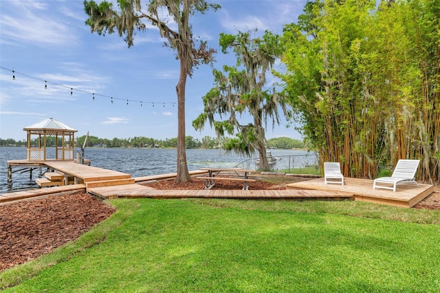 21906 Shamu Dr, Land O Lakes, FL 34639 - view of green lawn featuring a gazebo and a water view