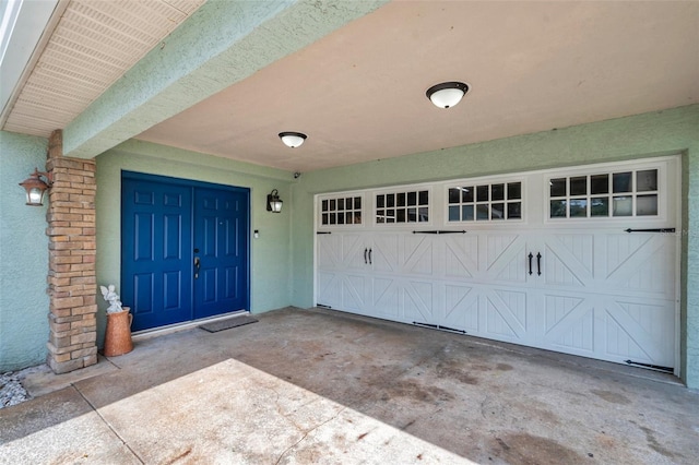 21906 Shamu Dr, Land O Lakes, FL 34639 - entrance to property with a garage and concrete driveway