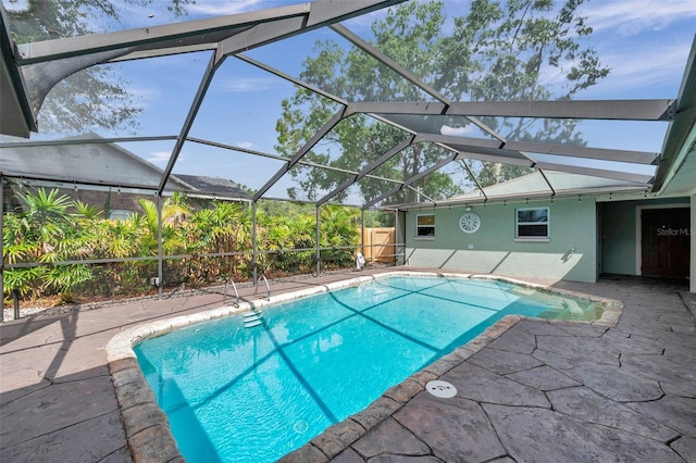 21906 Shamu Dr, Land O Lakes, FL 34639 - swimming pool featuring a patio and a lanai