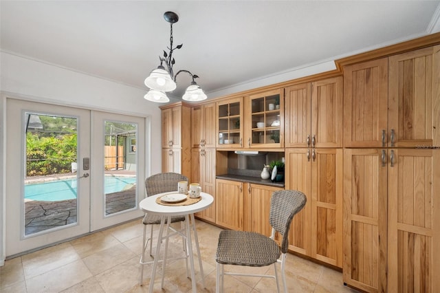 21906 Shamu Dr, Land O Lakes, FL 34639 - dining space featuring french doors and light tile patterned floors