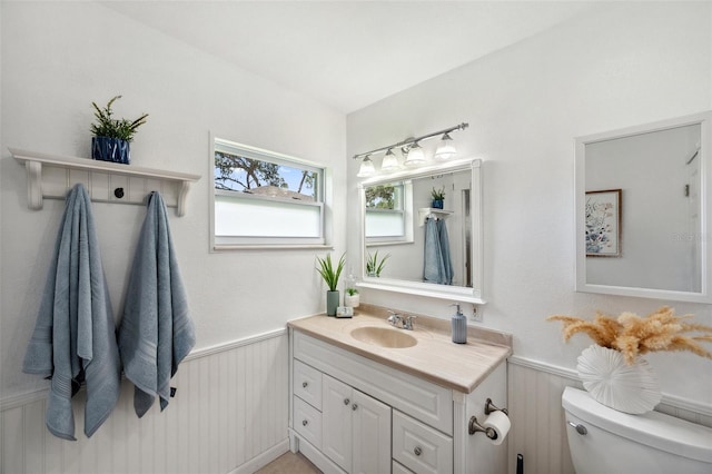 21906 Shamu Dr, Land O Lakes, FL 34639 - half bath featuring wainscoting and vanity