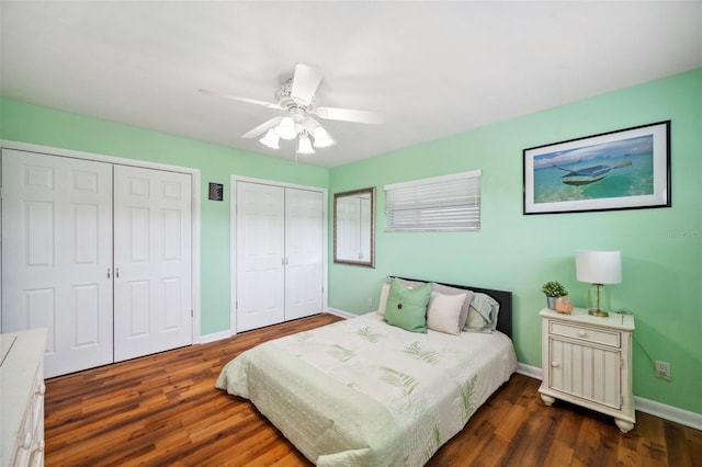 21906 Shamu Dr, Land O Lakes, FL 34639 - bedroom with multiple closets, wood finished floors, and ceiling fan