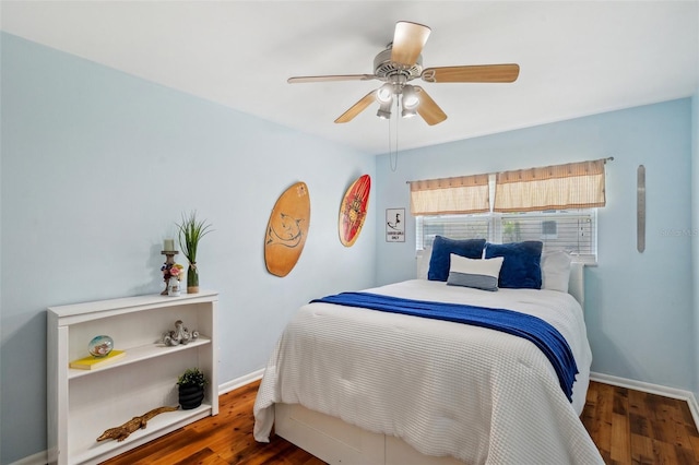 21906 Shamu Dr, Land O Lakes, FL 34639 - bedroom with wood finished floors and a ceiling fan
