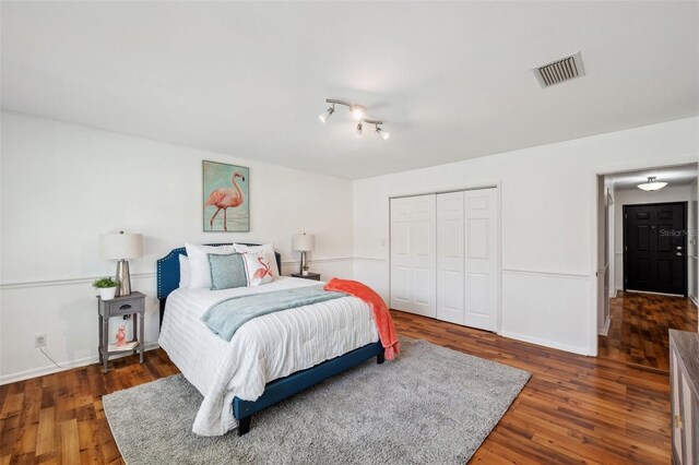 21906 Shamu Dr, Land O Lakes, FL 34639 - bedroom featuring wood finished floors and a closet