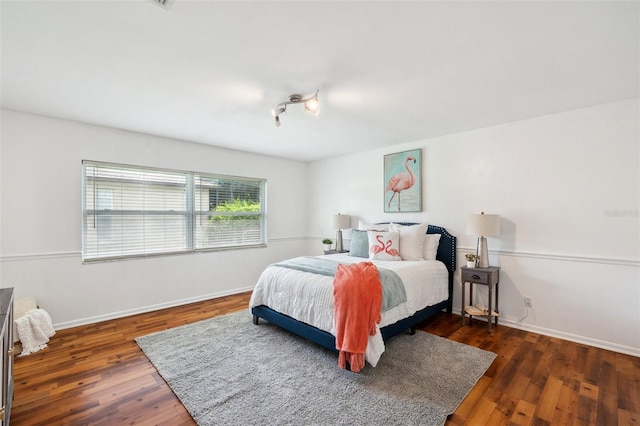21906 Shamu Dr, Land O Lakes, FL 34639 - bedroom with wood finished floors and baseboards