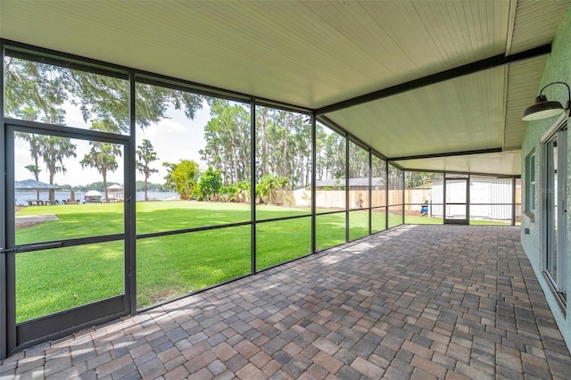 21906 Shamu Dr, Land O Lakes, FL 34639 - unfurnished sunroom with vaulted ceiling