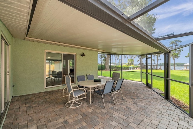 21906 Shamu Dr, Land O Lakes, FL 34639 - sunroom / solarium with outdoor dining area