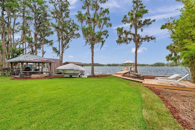 21906 Shamu Dr, Land O Lakes, FL 34639 - dock with a gazebo, a lawn, and a water view