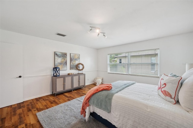 21906 Shamu Dr, Land O Lakes, FL 34639 - bedroom with wood finished floors and baseboards
