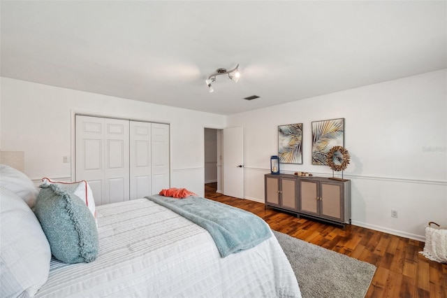 21906 Shamu Dr, Land O Lakes, FL 34639 - bedroom with wood finished floors and a closet