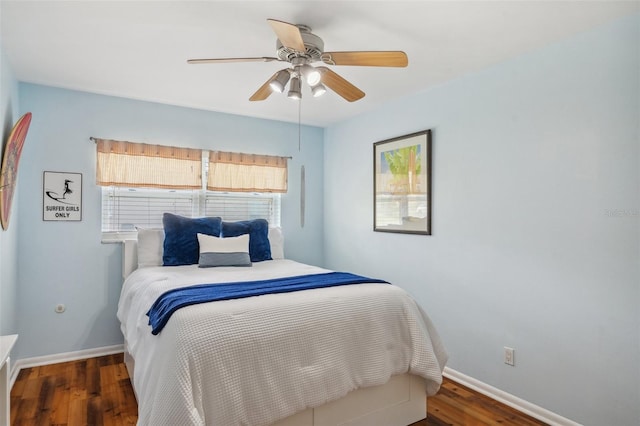 21906 Shamu Dr, Land O Lakes, FL 34639 - bedroom with wood finished floors and ceiling fan