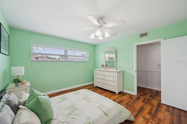 21906 Shamu Dr, Land O Lakes, FL 34639 - bedroom with wood finished floors and ceiling fan