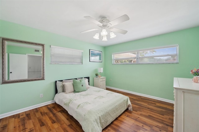 21906 Shamu Dr, Land O Lakes, FL 34639 - bedroom with wood finished floors and ceiling fan