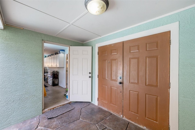 21906 Shamu Dr, Land O Lakes, FL 34639 - entryway featuring a textured wall