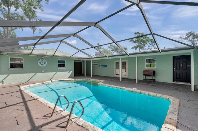 21906 Shamu Dr, Land O Lakes, FL 34639 - swimming pool featuring a patio area and a lanai