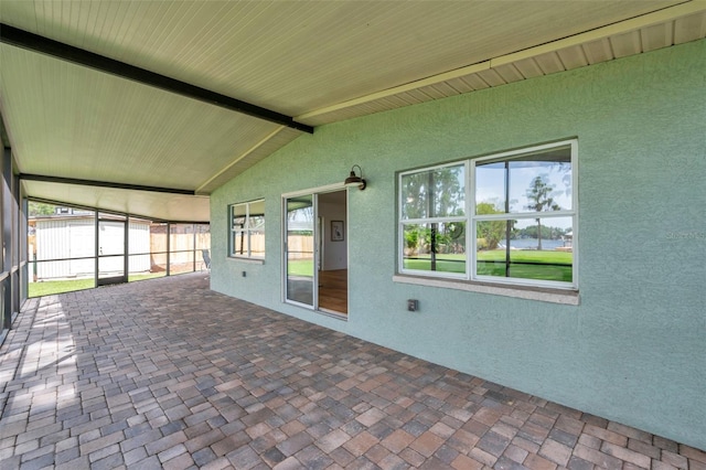 21906 Shamu Dr, Land O Lakes, FL 34639 - unfurnished sunroom with plenty of natural light