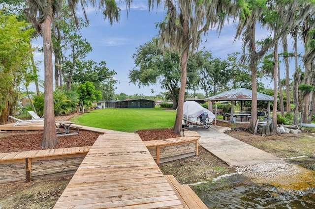 21906 Shamu Dr, Land O Lakes, FL 34639 - dock area with a gazebo and a yard