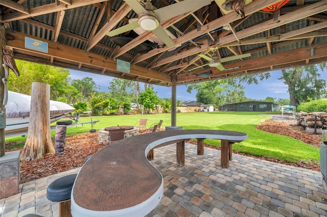 21906 Shamu Dr, Land O Lakes, FL 34639 - view of patio with a fire pit and a ceiling fan
