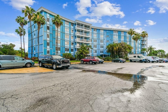 3315 58th Ave S Unit 311, Saint Petersburg, FL 33712 - view of apartment building / complex featuring uncovered parking