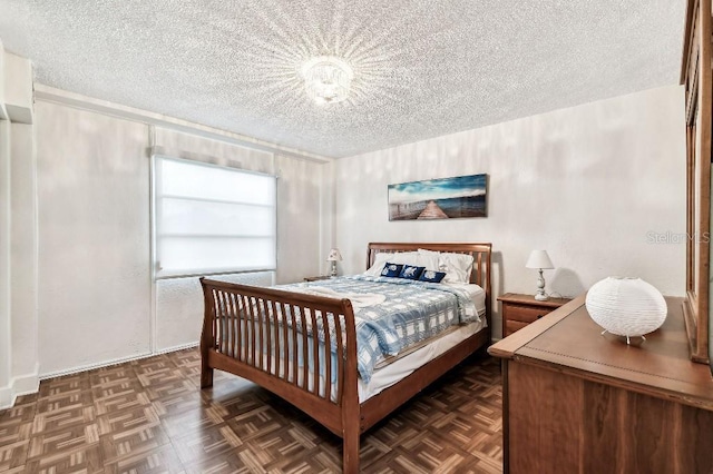 3315 58th Ave S Unit 311, Saint Petersburg, FL 33712 - bedroom with a textured ceiling
