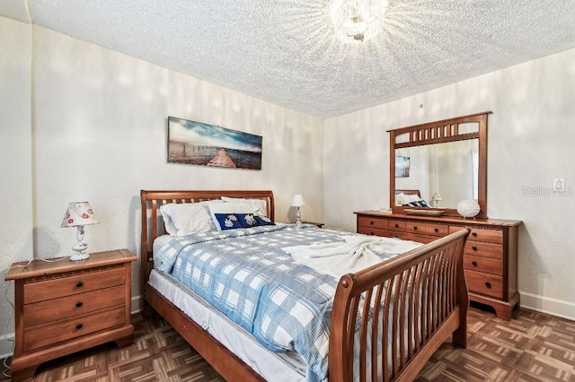 3315 58th Ave S Unit 311, Saint Petersburg, FL 33712 - bedroom featuring a textured ceiling
