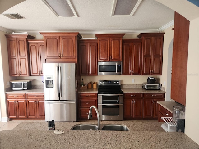 1753 Open Field Loop, Brandon, FL 33510 - kitchen with stainless steel appliances, ornamental molding, and light stone countertops