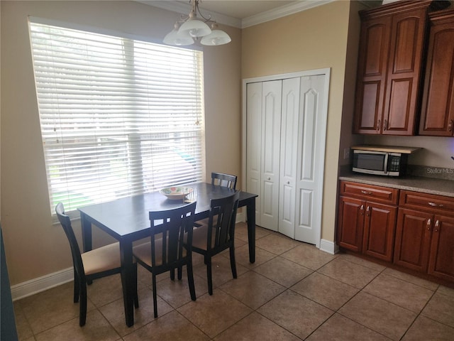 1753 Open Field Loop, Brandon, FL 33510 - dining space with ornamental molding, healthy amount of natural light, and light tile patterned flooring