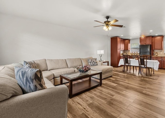 4945 91st Ave N Unit 30, Pinellas Park, FL 33782 - living room with ceiling fan, light wood-type flooring, and recessed lighting