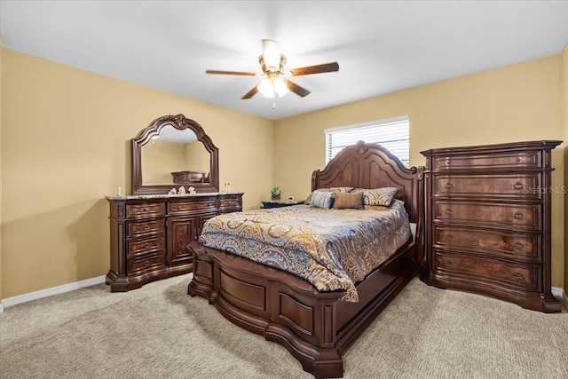4945 91st Ave N Unit 30, Pinellas Park, FL 33782 - bedroom featuring light colored carpet and ceiling fan