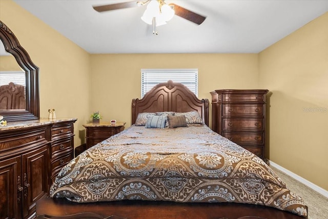 4945 91st Ave N Unit 30, Pinellas Park, FL 33782 - carpeted bedroom with baseboards and a ceiling fan
