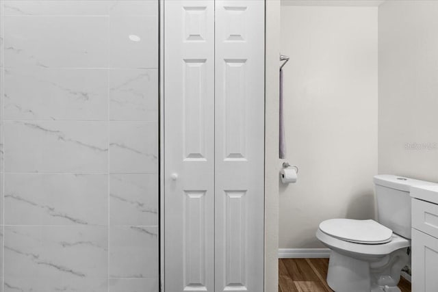 4945 91st Ave N Unit 30, Pinellas Park, FL 33782 - bathroom featuring a closet, wood finished floors, and vanity