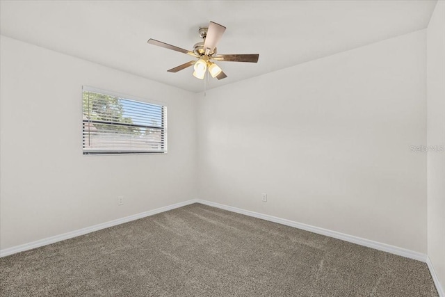 4945 91st Ave N Unit 30, Pinellas Park, FL 33782 - carpeted spare room with baseboards and a ceiling fan