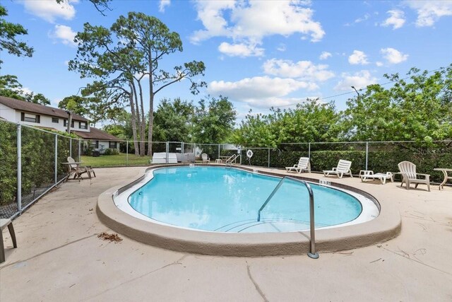 4945 91st Ave N Unit 30, Pinellas Park, FL 33782 - community pool with a patio area