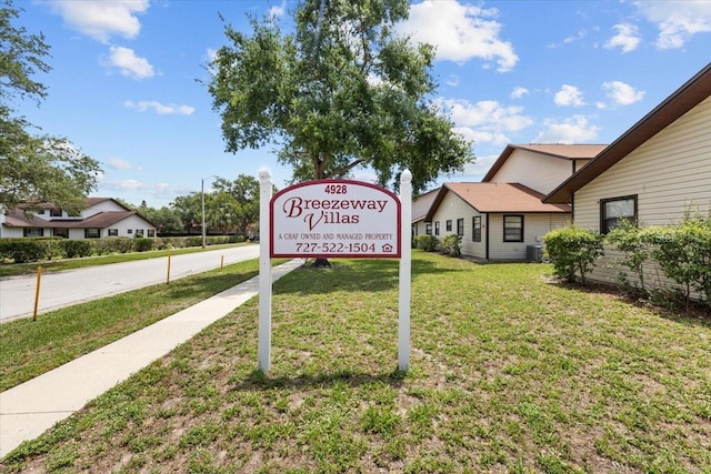 4945 91st Ave N Unit 30, Pinellas Park, FL 33782 - community sign featuring a lawn