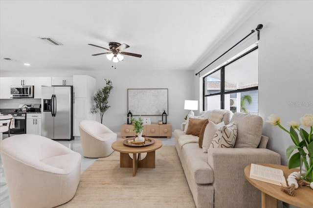6370 Elmhurst Dr, Pinellas Park, FL 33782 - living area with ceiling fan