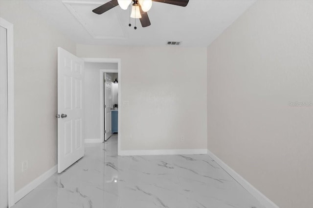 6370 Elmhurst Dr, Pinellas Park, FL 33782 - spare room featuring a ceiling fan and marble finish floors