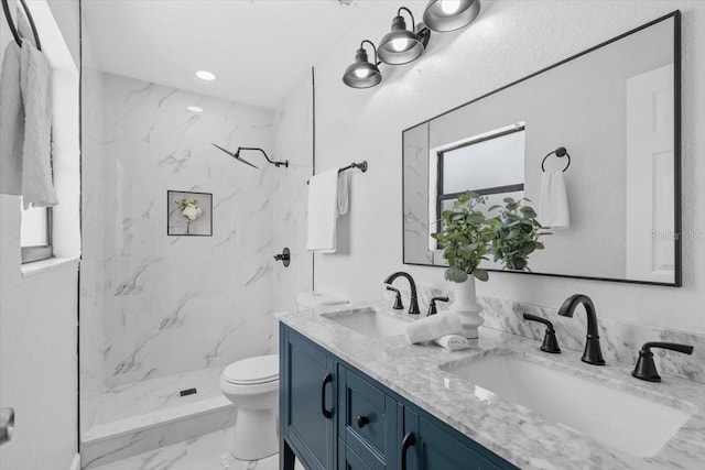 6370 Elmhurst Dr, Pinellas Park, FL 33782 - full bathroom with double vanity, marble finish floors, and a marble finish shower
