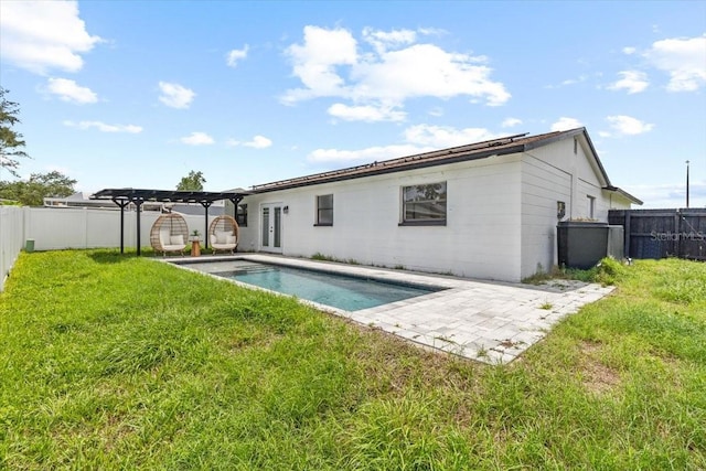 6370 Elmhurst Dr, Pinellas Park, FL 33782 - back of house featuring a fenced backyard, a patio area, and a pergola