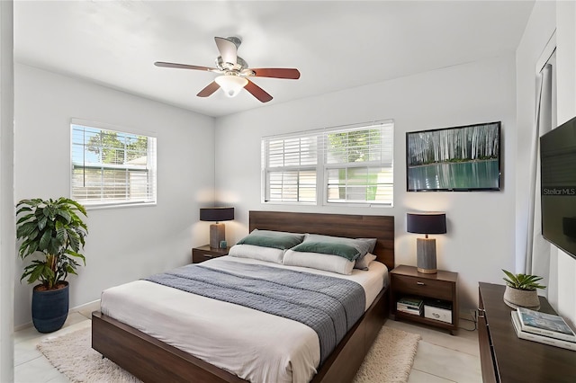 109 Emerald Ln, Largo, FL 33771 - bedroom featuring light tile patterned floors and ceiling fan