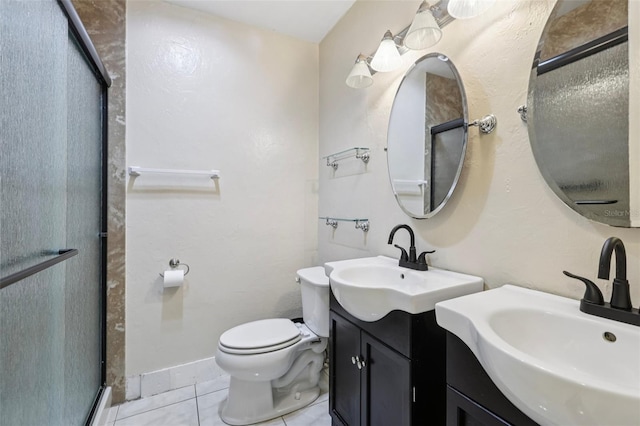 109 Emerald Ln, Largo, FL 33771 - bathroom featuring a shower stall, tile patterned floors, and two vanities