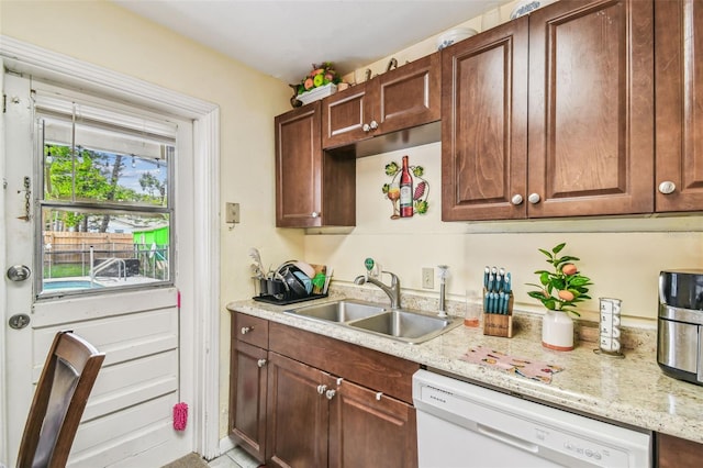1711 W Followthru Dr, Tampa, FL 33612 - kitchen featuring dishwasher and light stone countertops