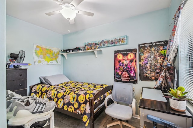 1711 W Followthru Dr, Tampa, FL 33612 - tiled bedroom with a ceiling fan