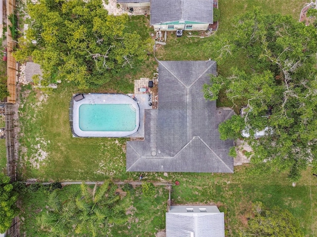 1711 W Followthru Dr, Tampa, FL 33612 - aerial view of property and surrounding area featuring a pool area