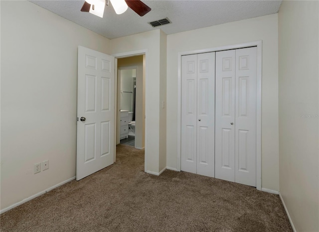 945 Hamilton Ct, Palm Harbor, FL 34683 - unfurnished bedroom featuring carpet floors, a closet, and ceiling fan