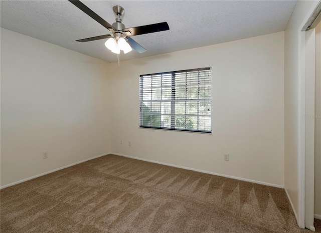 945 Hamilton Ct, Palm Harbor, FL 34683 - carpeted spare room with ceiling fan and a textured ceiling