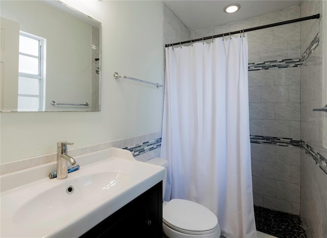 945 Hamilton Ct, Palm Harbor, FL 34683 - full bath with vanity, a tile shower, and tile walls
