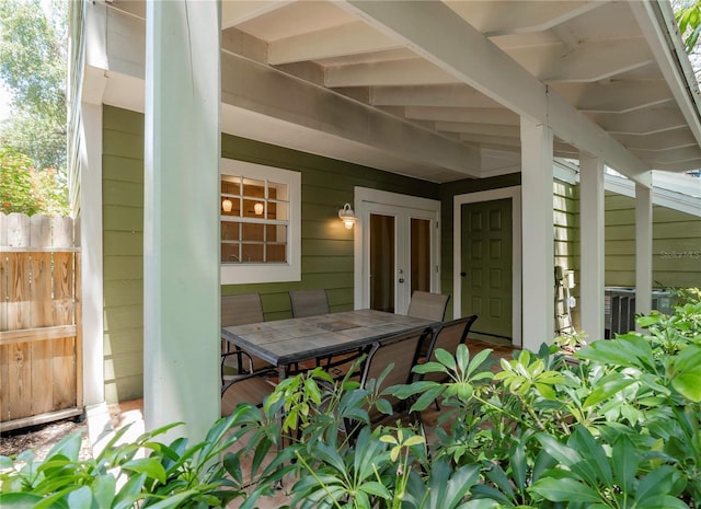 945 Hamilton Ct, Palm Harbor, FL 34683 - view of patio / terrace with outdoor dining space and french doors