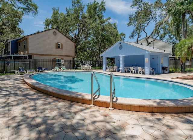 945 Hamilton Ct, Palm Harbor, FL 34683 - community pool with a patio area